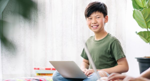 Boy with laptop learning logical reasoning for kids