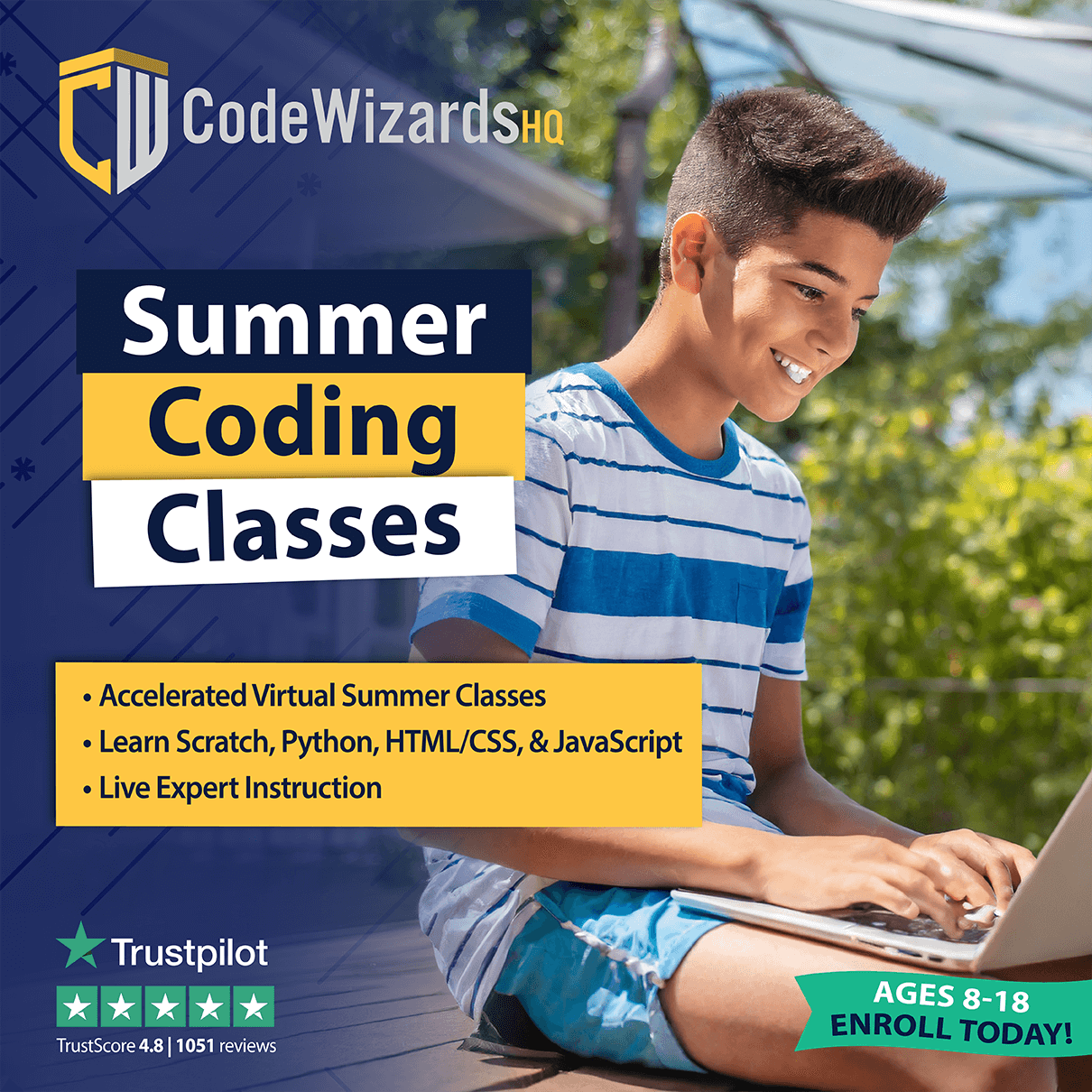 Summer coding classes with boy in striped shirt at computer